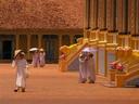 Caodaists arrive for the noon ceremony.